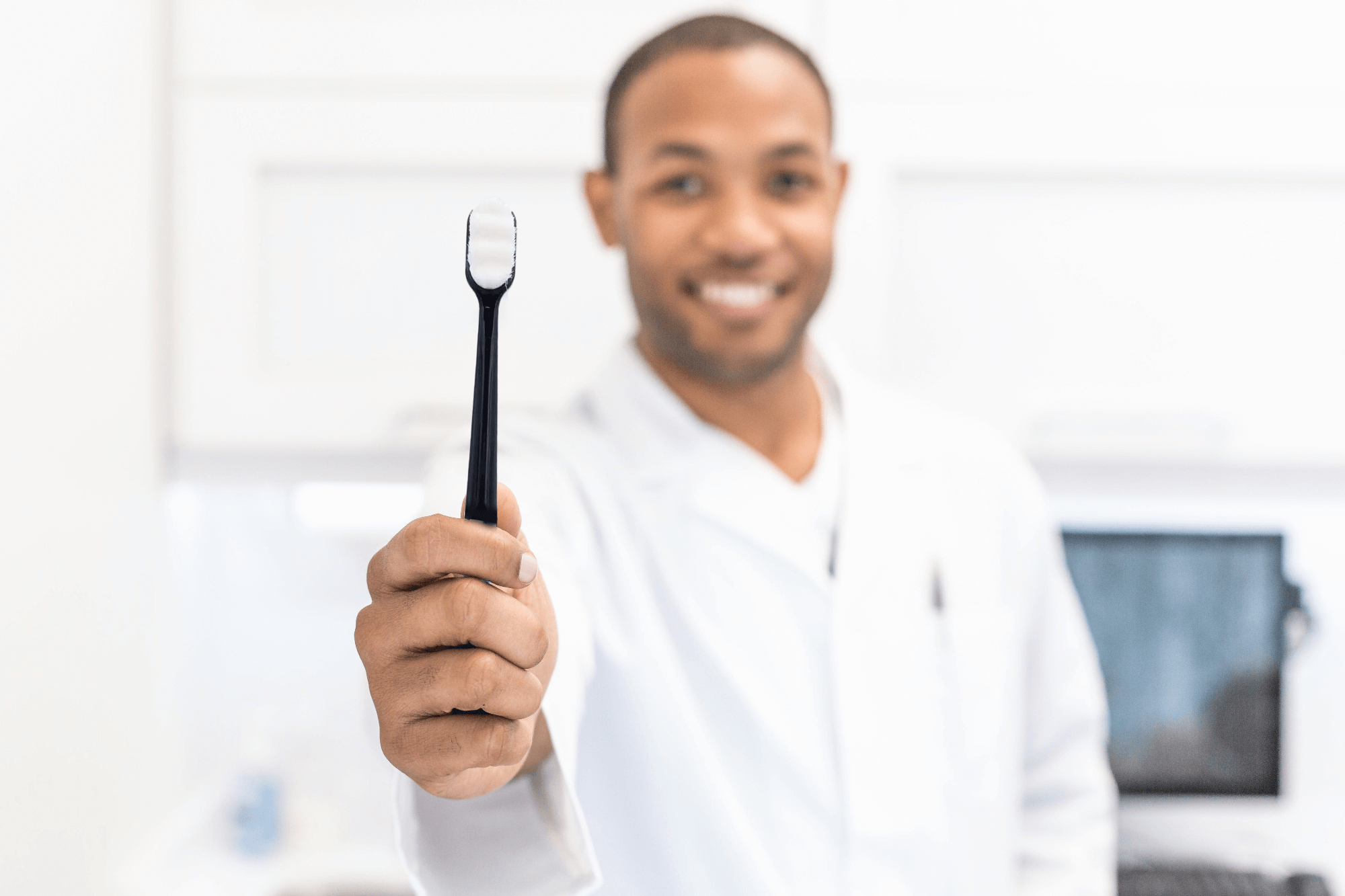 toothbrush-and-dentist.png__PID:d30e727a-ad82-4ea8-ba17-db5f9b5e5307